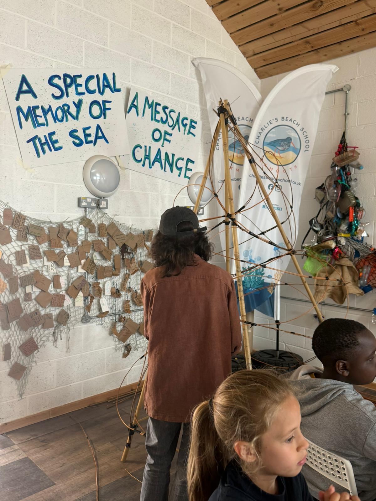 A sheet hanging with notes on it