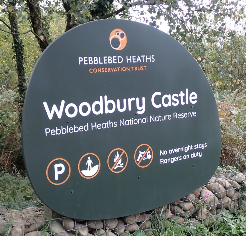 black entrance sign to woodbury casrle